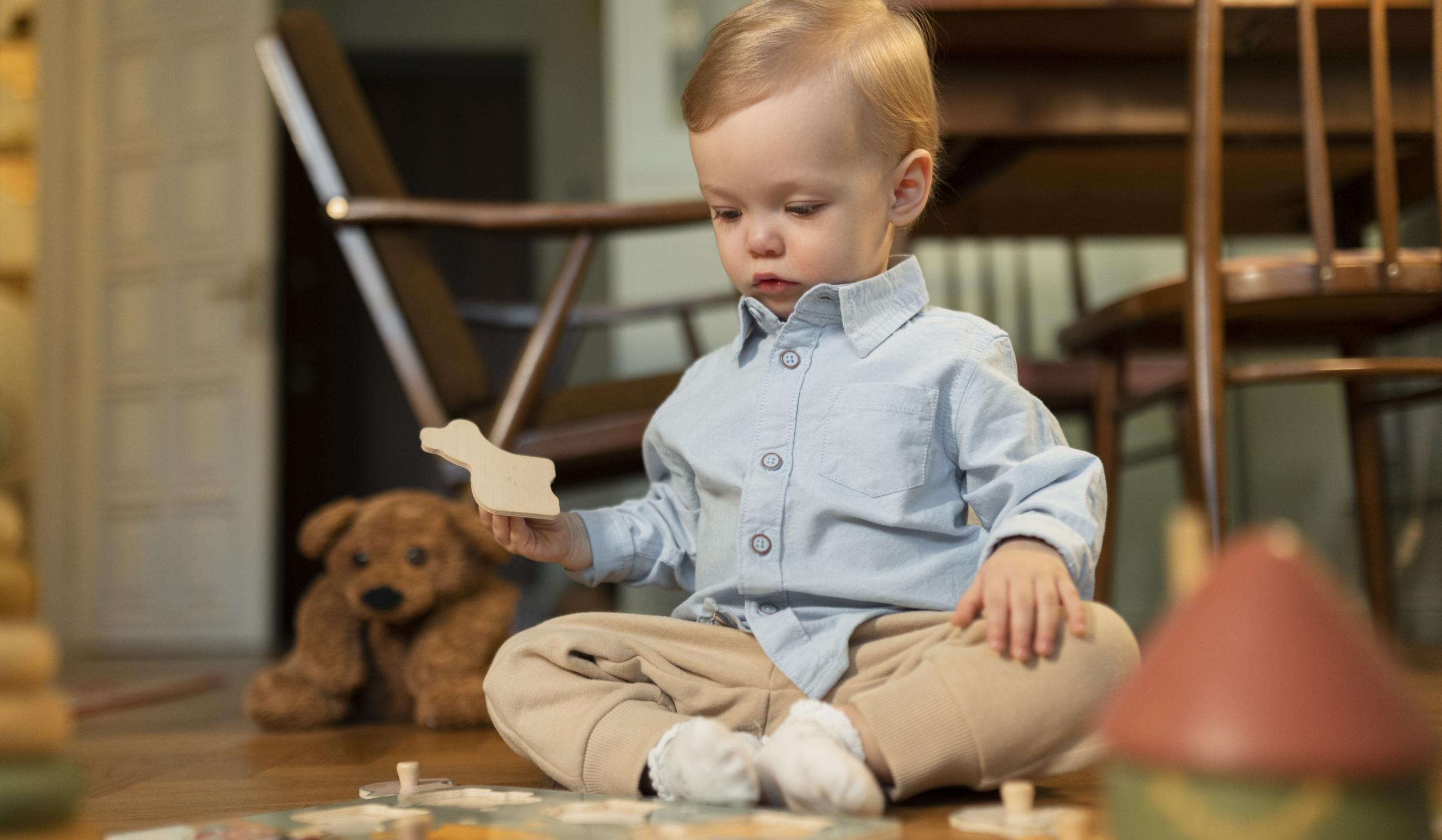 close-up-cute-baby-with-toys